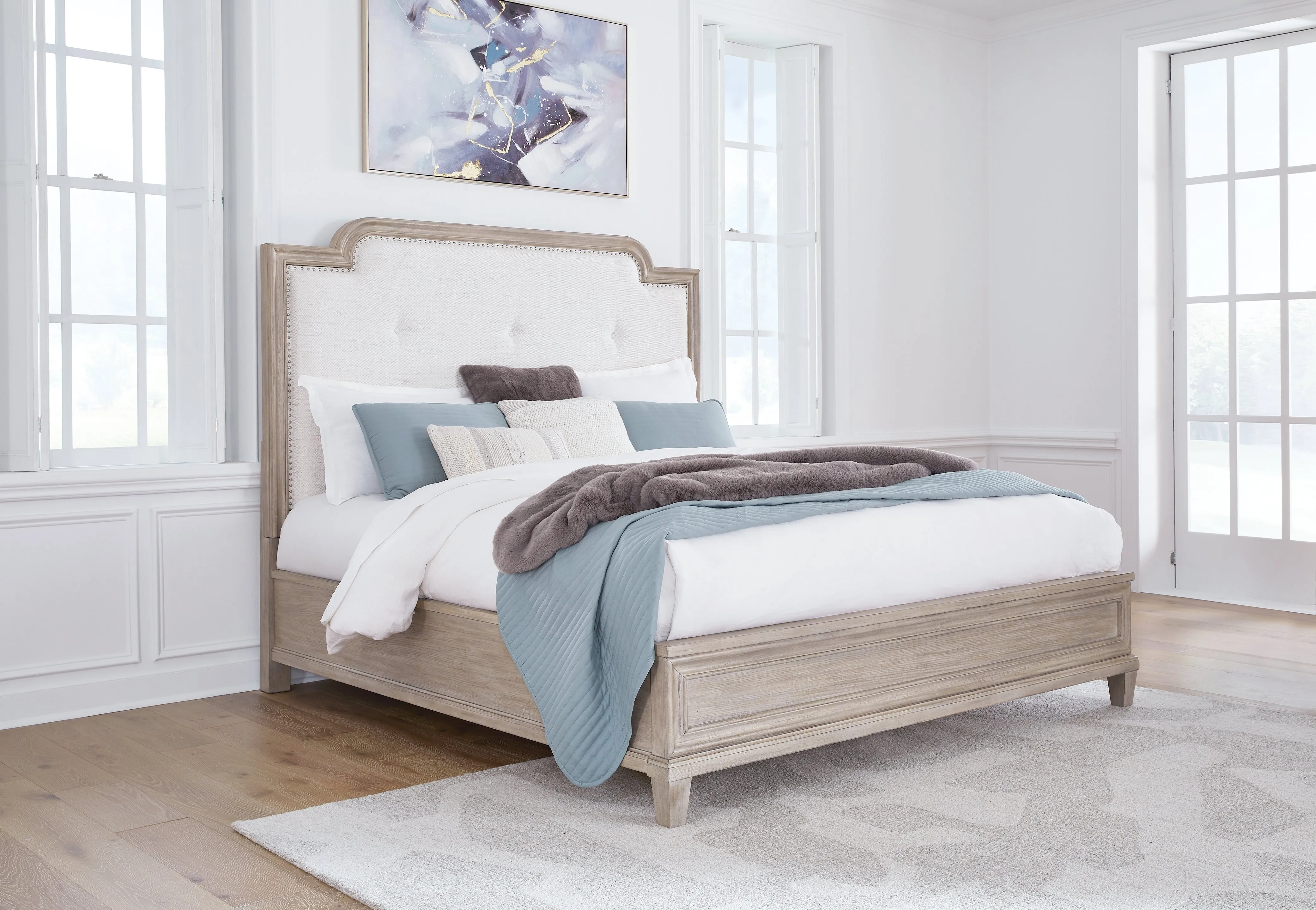 Jorlaina King Upholstered Panel Bed